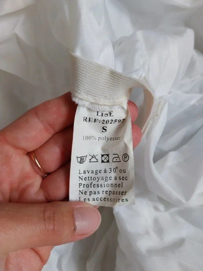 Robe de mariée à bretelle blanche - photo numéro 13