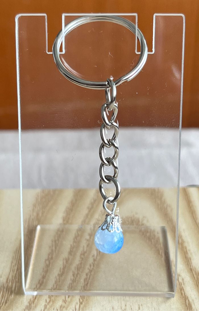 Porte clé perle bleu