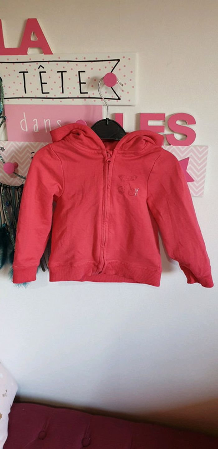 Gilet à capuche zippé