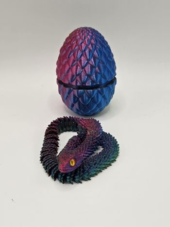 🐉Œuf style dragon en 3D  avec son serpent articulé assorti🐍.