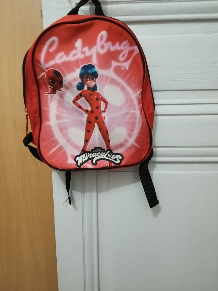 Sac à dos miraculous rouge et multicolore