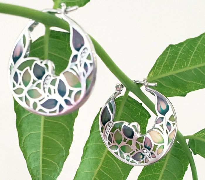 Boucles d'oreilles originales pour femme MOISS. En argent de haute qualité avec une surface rhodiée

2.7 x 2.5 cm - photo numéro 3