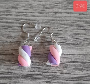 a vendre boucles d'oreilles.neuves emballees