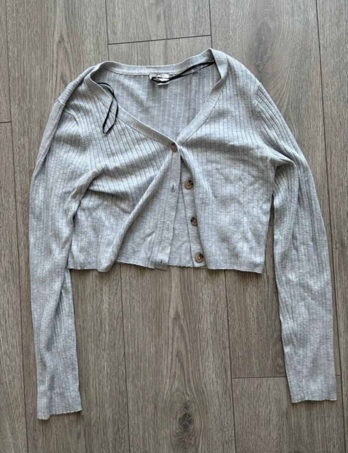 Gilet court à boutons