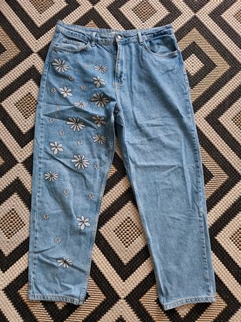 Jean femme STR  taille 44  motif floral  avec retouche