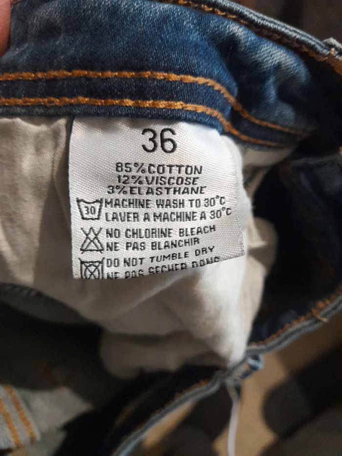 Jeans style usé bleu - photo numéro 11