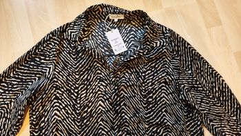Chemisier neuf à motif zébré noir et beige