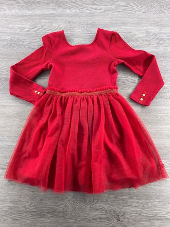 Robe rouge, Okaïdi, huit ans