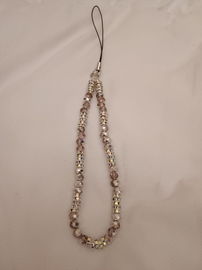 Dragonne en perles roses pour téléphone