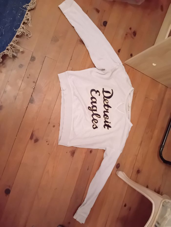 Pull à manches longues.