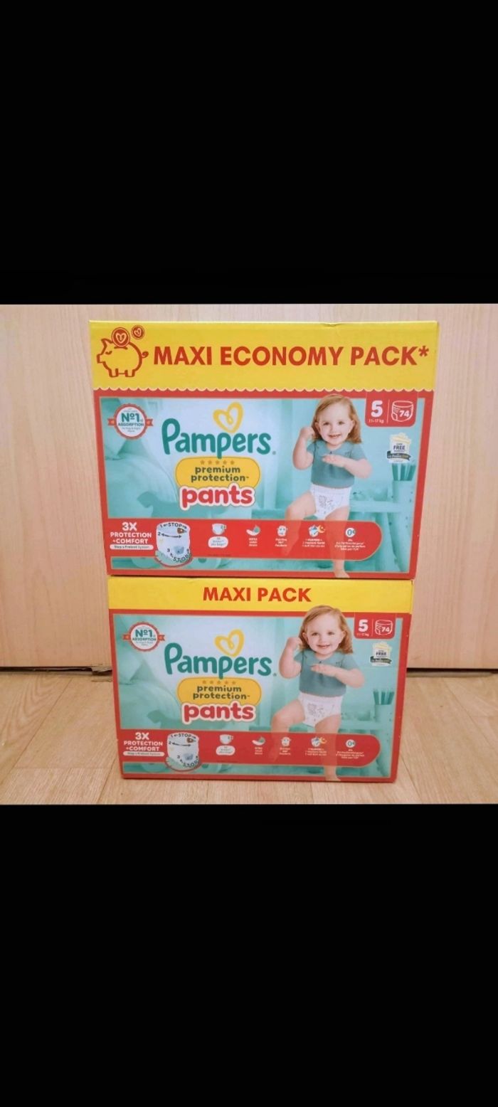 Lot pampers premium protection pants taille 5(148 couches)