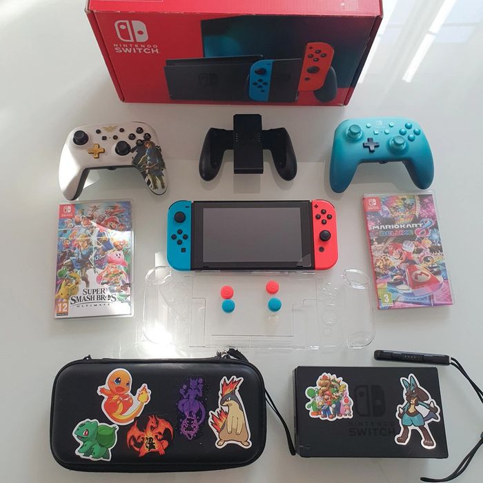 Switch complète + 2 jeux + 2 manettes - photo numéro 3