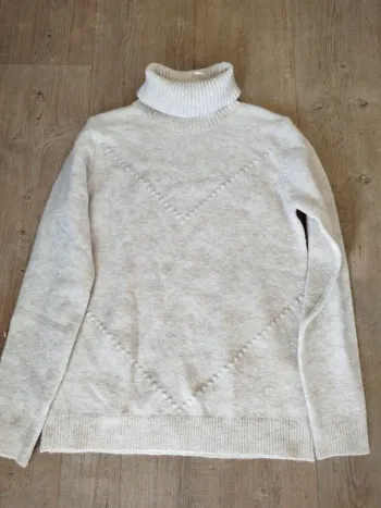 Pull col roulé