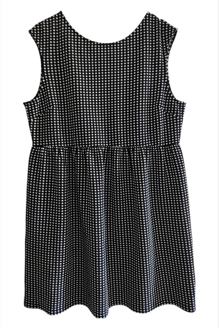 Robe noire à pois blancs sans manche - Geena
Taille XXL - photo numéro 3