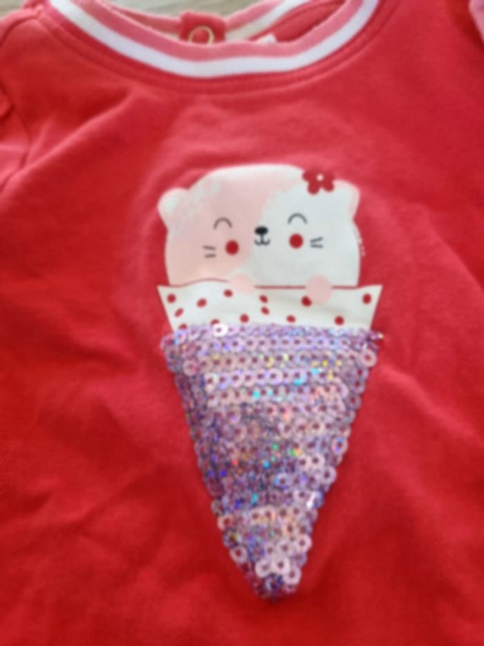 t shirts rose Orchestra avec strass sur l'un