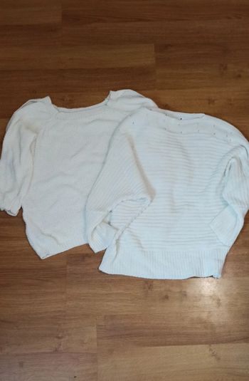 Lot de deux pull blanc à grosses mailles.