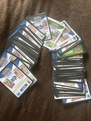 Carte Pokémon Lot de 170 cartes JCC Pokémon live  Team rocket Aventure ensemble