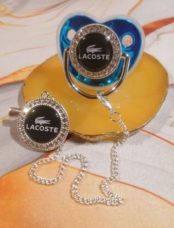 Tétine Lacoste bleu