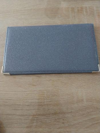 Porte carnet de chèque à paillettes