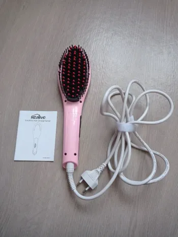 Brosse chauffante a lisser rose