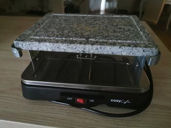 Appareil à raclette avec pierrade