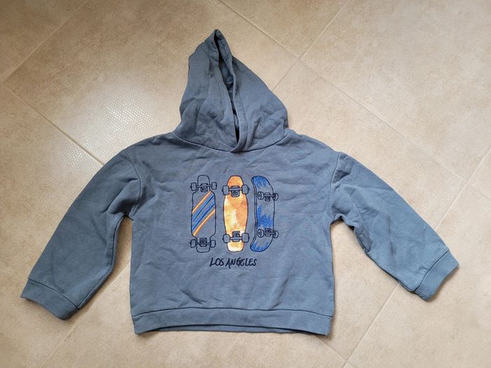 Sweat capuche skate kiabi 6 ans sequin bleu et orange