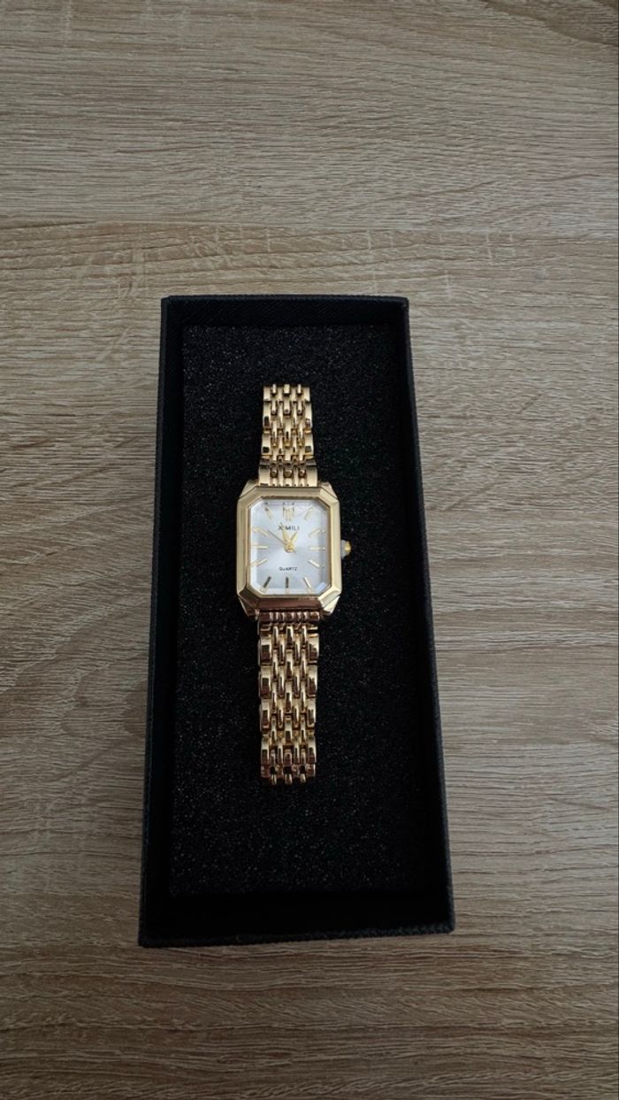 Montre dorée élégante cadran blanc chic femme - photo numéro 3