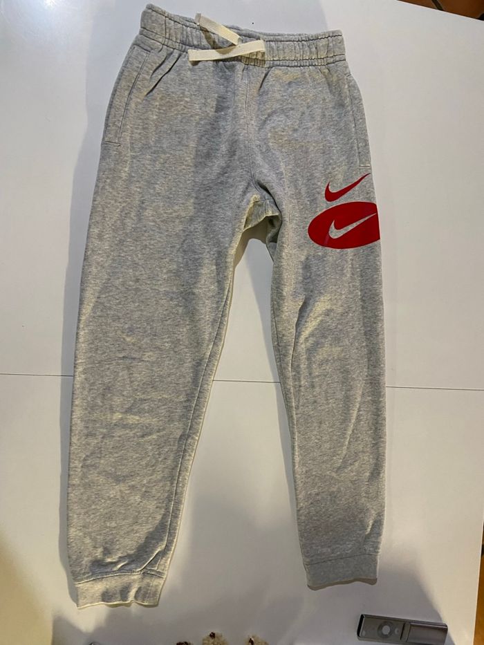 Bas jogging gris Nike taille M enfants