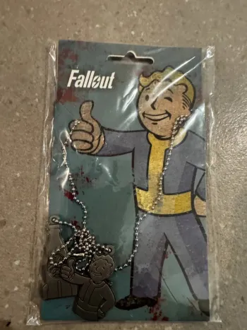 Pendentif Fall out, neuf
