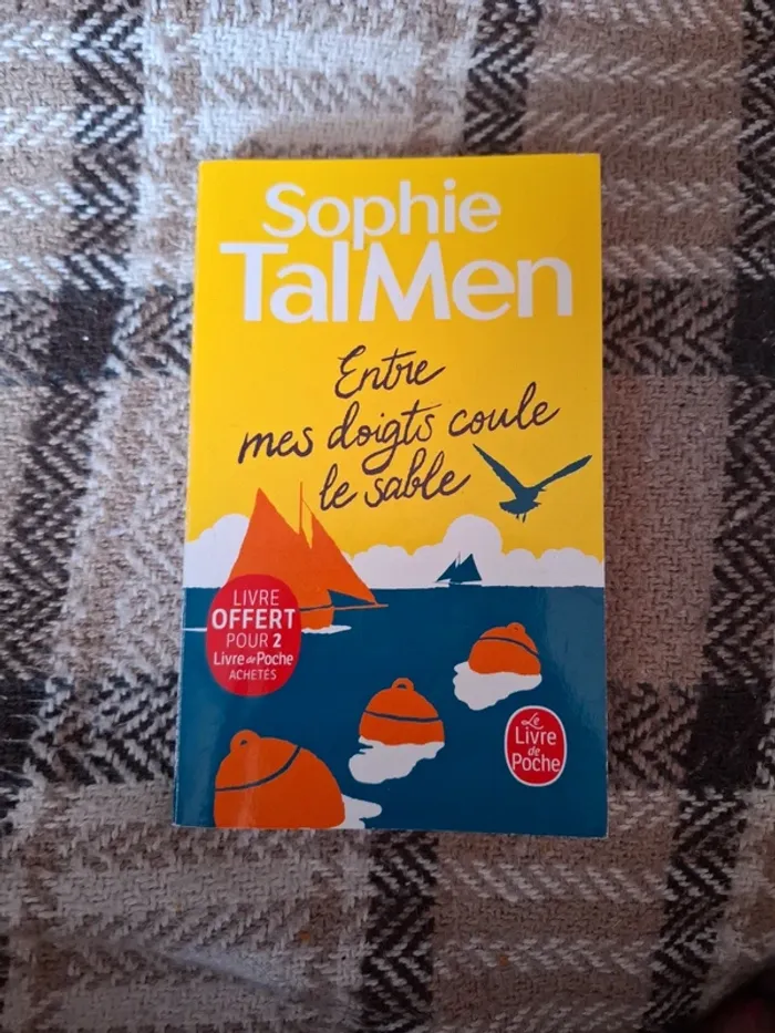 Entre mes doigts coule le sable