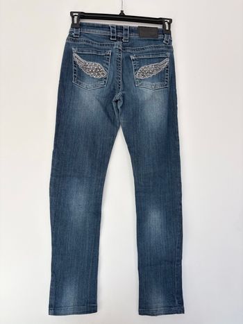 Jean slim bleu avec ailes brodées au dos – taille XS