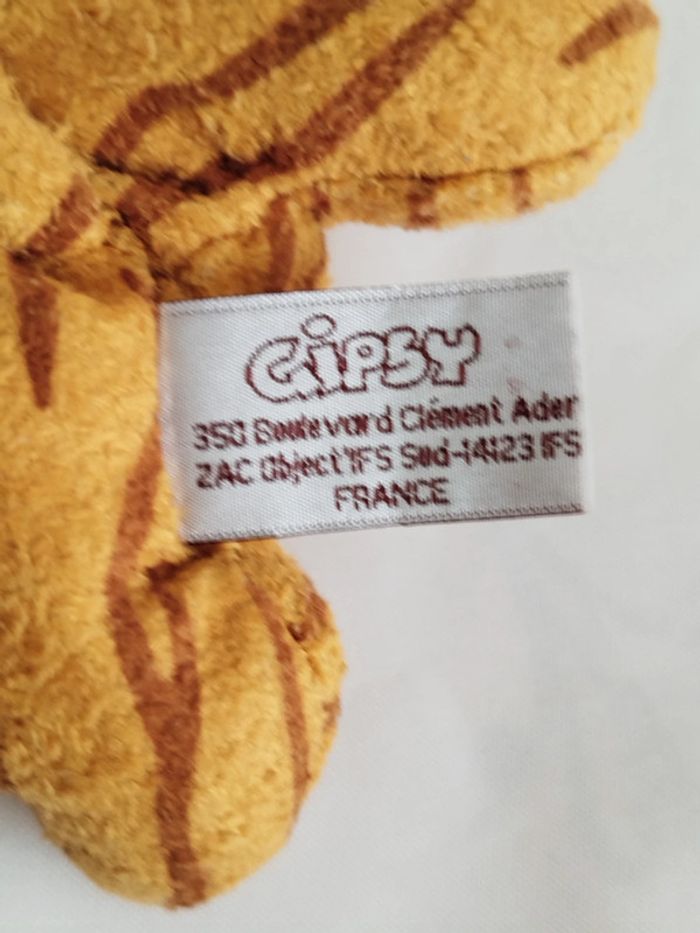 Tigre marron et moutarde allongé Gipsy - photo numéro 3