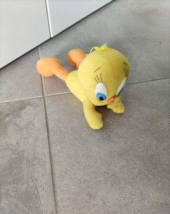 Petite peluche titi allongé
