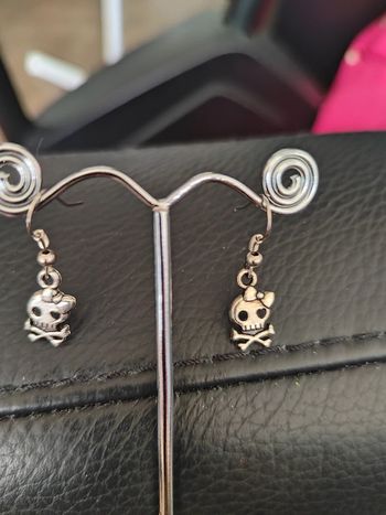 Boucles d'oreilles tête