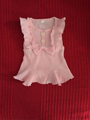 Robe rose volant et petit nœud
