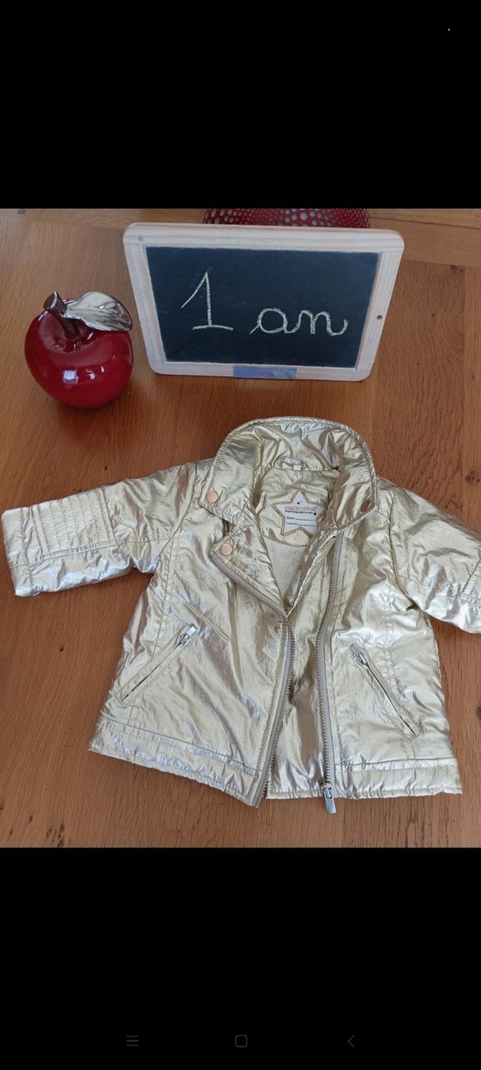 Veste Orchestra taille 1 an en très bon état