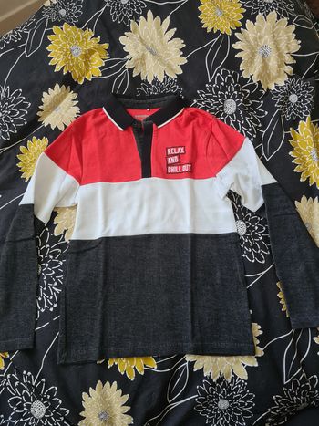 Polo manche longues 12 ans neuf