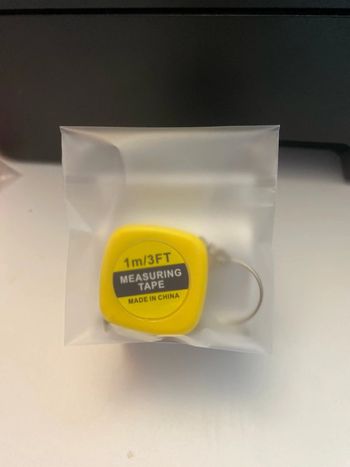 Porte clés mètre rétractable 1m