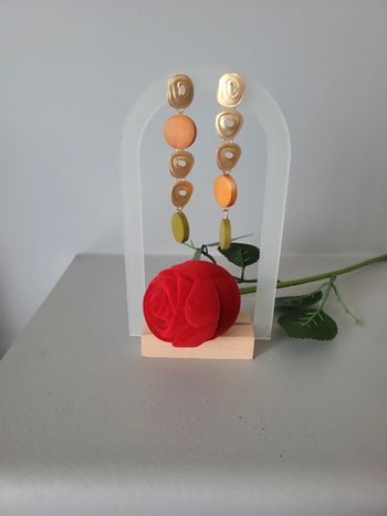 Boucles asymetriques acier gold brossé