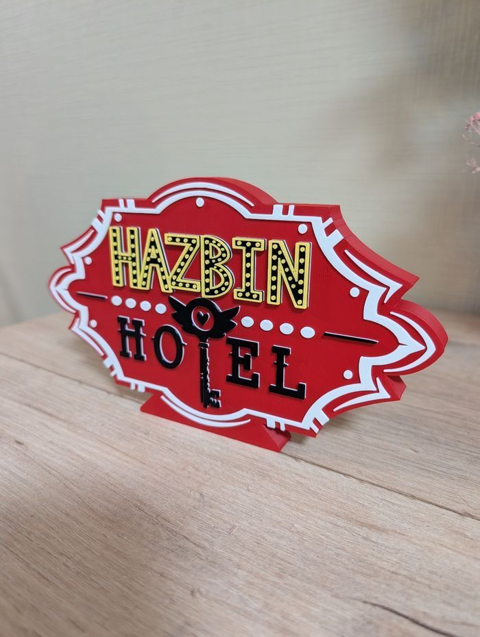 Hazbin Hotel logo décoratif 21x12cm Excellent état - photo numéro 2