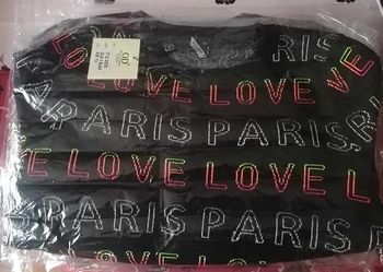 Pull court noir à inscription