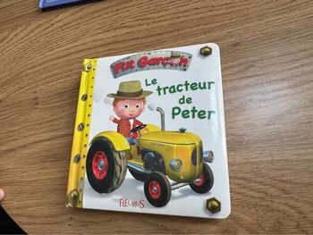Livre P’tit Garçon Le tracteur de Peter très bon état 9782215088745
