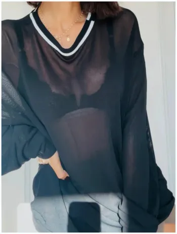Haut Versace noir en maille fine  XL bon état