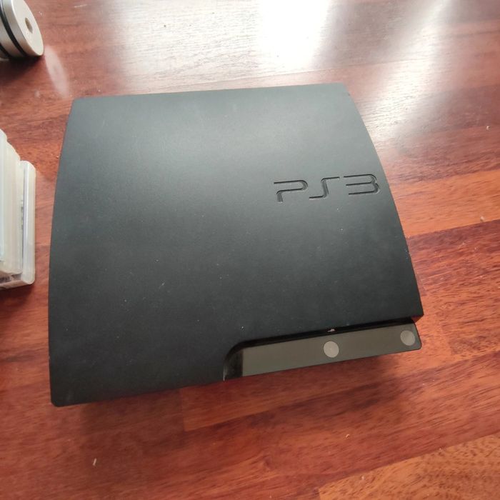 Console PS3 slim avec 10 jeux - photo numéro 4
