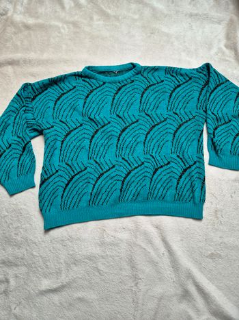 Pull vert et noir détails brillants