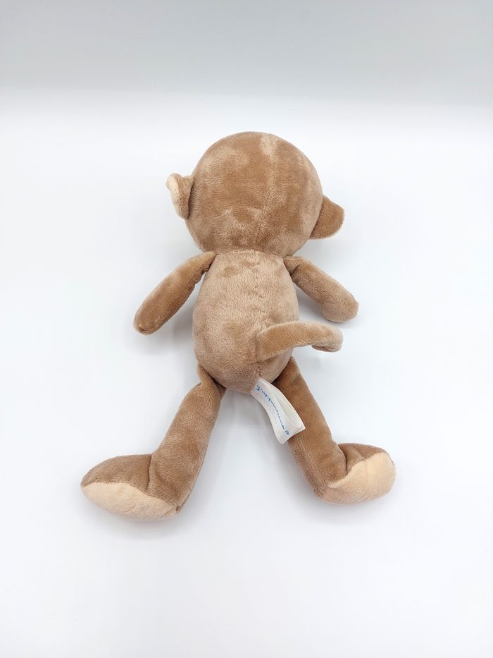 Peluche doudou singe marron beige blanc Arthur et Lola 26 cm Créaprim Village - photo numéro 2