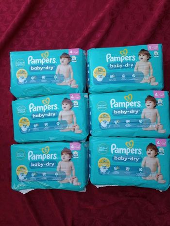 Six paquets de couches Pampers baby-dry T4 taille