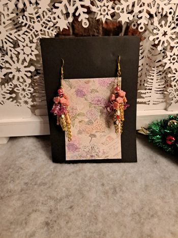 Boucles d'oreilles pendante rose doré