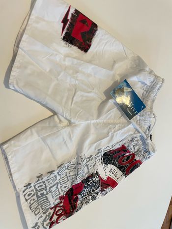 Short de bain blanc taille 8 ans survive sport
