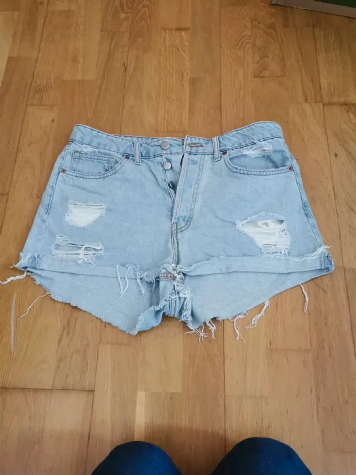 Short en jean troué H&M taille 38